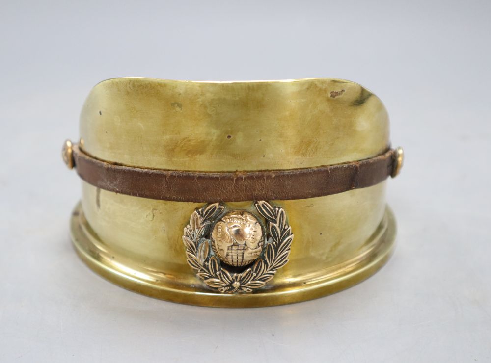 A Trench Art Army cap ashtray marked 1916, diameter 13cm